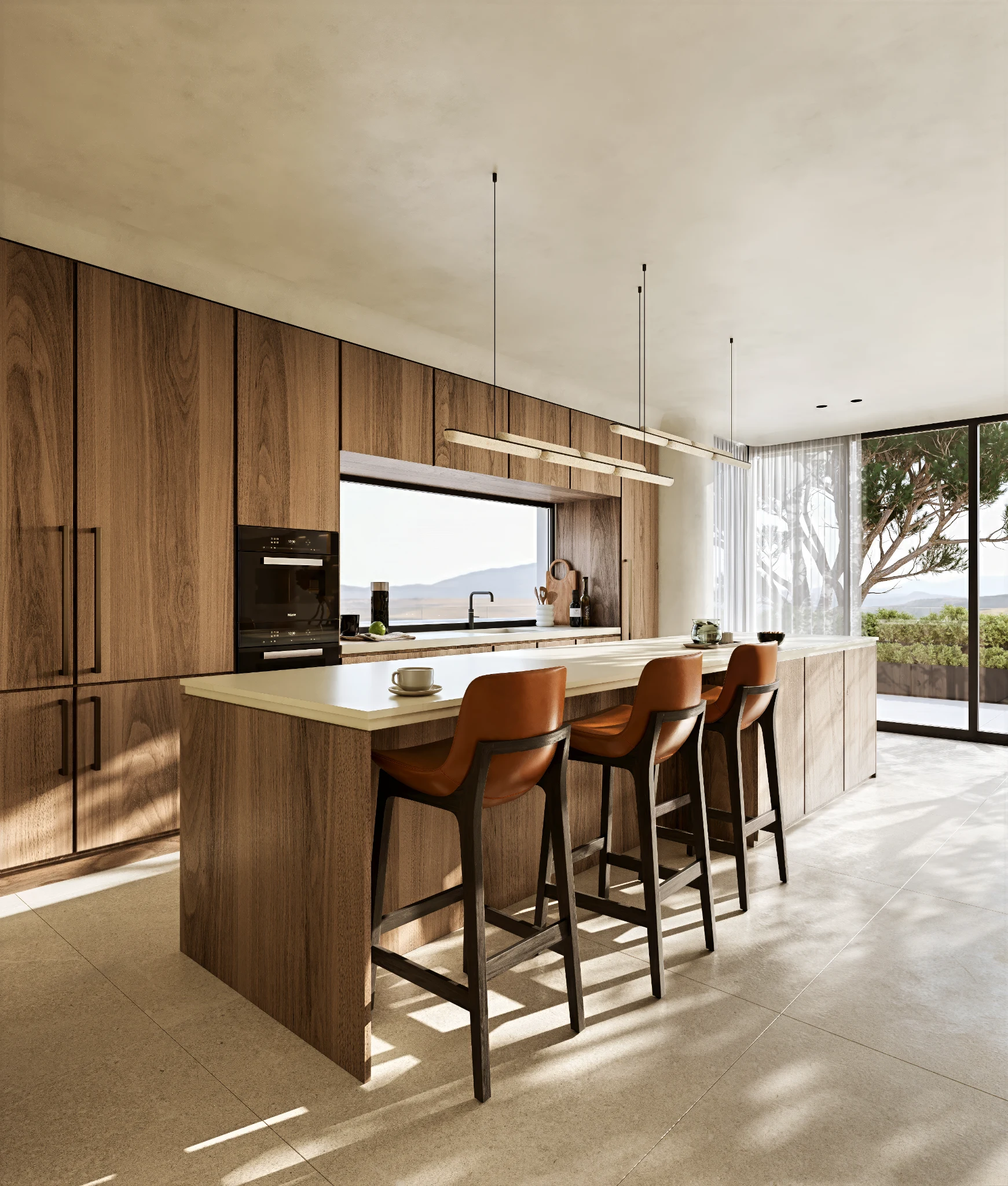 Kitchen with timber cabinetry, a light island and terracotta bar stools